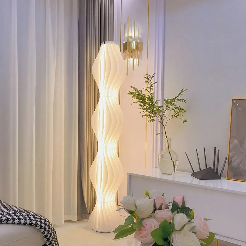 Lampadaire design vague sculpturale blanc LED Maison de la Lumière