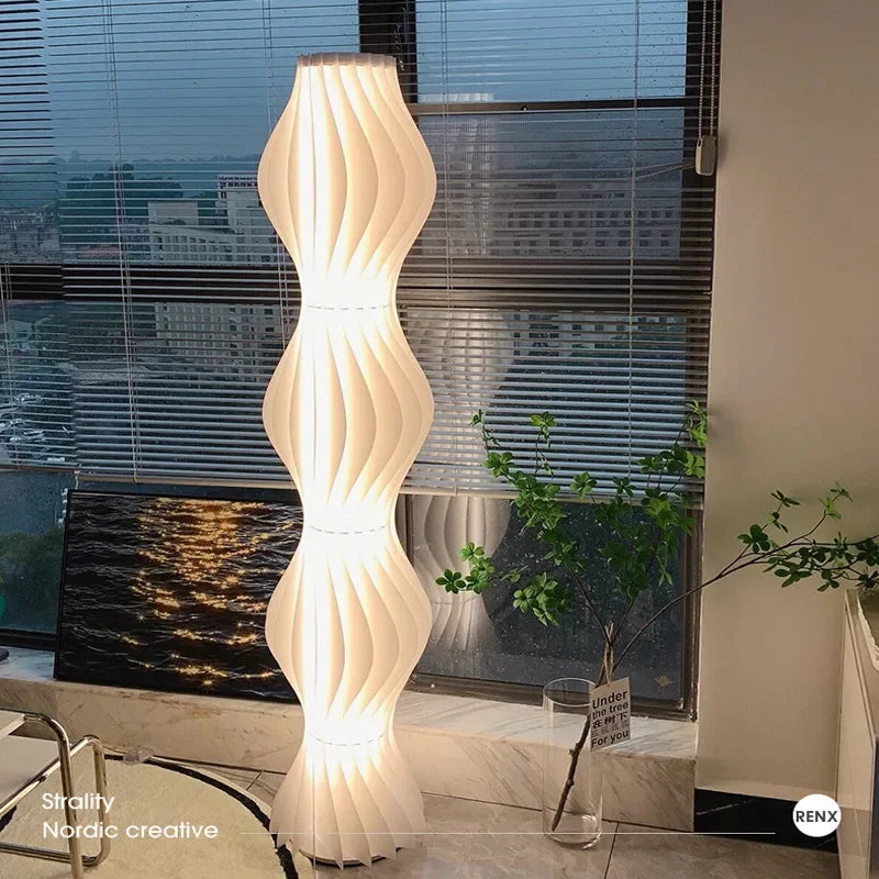Lampadaire design vague sculpturale blanc LED Maison de la Lumière